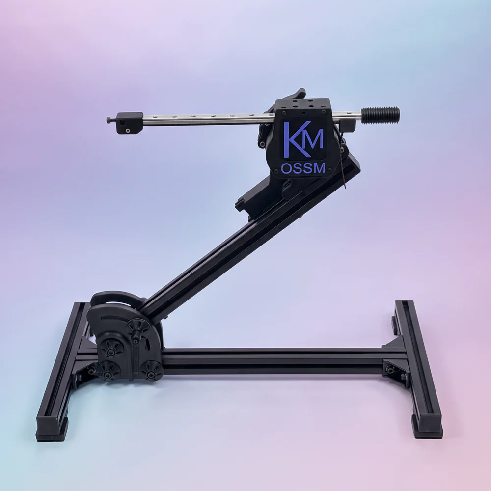 OSSM open-source sex machine built from aluminum extrusion and black hardware, with KM OSSM branding